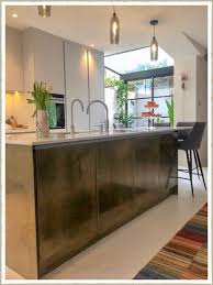 Huge kitchen islands are making their way into homes everywhere and are very metal and marble both add a beautiful finish to the kitchen elements. Pin On New Home