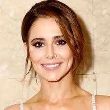 Cheryl Cole stuns in orange supporting Kimberly Walsh's musical debut