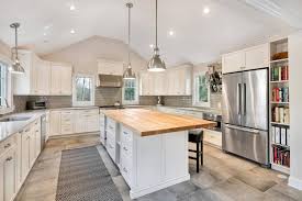Vaulted ceilings in the kitchen large island with pendant. Kitchen With Cathedral Ceiling Ideas House Plans