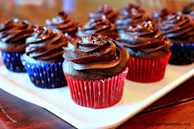 These paleo chocolate cupcakes are moist but not eggy and have a rich, dark chocolaty taste! Gluten Free Chocolate Cupcakes With Fudge Frosting