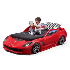 If you cross a red car with a plastic boat and combine the result with one of those big victorian baby carriages, you get this entirely novel mode of tot transportation. Corvette Z06 Toddler To Twin Bed Kids Bed Step2