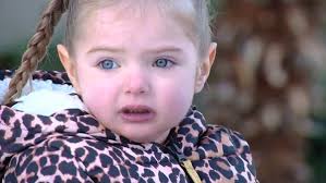 Police surprise sick little girl by driving five tons of snow to her home