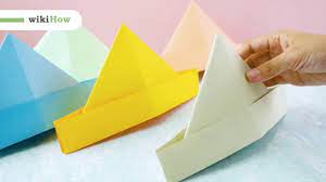 Once you have your measurement, cut a strip of cardboard out to a little longer than that length. 3 Ways To Make A Paper Hat Wikihow