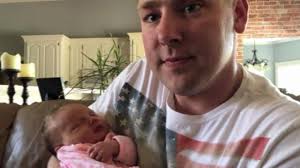 Stranded soldier watches daughter's birth