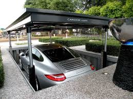 Fancy Adding A Touch Of James Bond Gadgetry To Your Home Why Not Install A Practical Cardok To Solve All Y Garage Design Underground Garage Parking Solutions