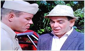 Frank Sutton as Sgt Carter and Friendly Freddy