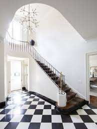 Black And White Ceramic Floor Tile Checkered Ceramic Floor Tile In The Entryway Foyer Tile Black And White Checkered Floor Curved St Black And White Hallway Entryway Stairs White Staircase