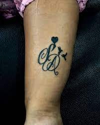 Couple Matching Latter Tattoo Artist Anndy Tattoo Page Artificetattoostudi Couples Tattoo Designs Tattoo Lettering Styles Heartbeat Tattoo Design