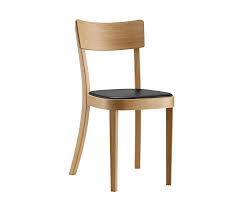 This classic wooden chair dates back to the middle ages, and quickly became a luxury piece when furniture designers began crafting them out of walnut. Upholstered Wooden Chair Classic 1 383 From Horgenglarus