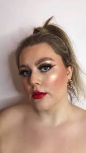 Smokey brown liner with red lip