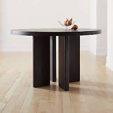 When looking for a modern dining room table, consider shape and material to determine your style. Unique Modern Dining Tables Cb2