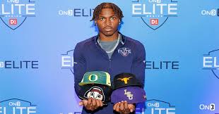 Where will 5-star WR Dakorien Moore play college football?