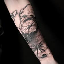 The most famous tattoos are the wrist tattoos, back tattoos, elbow tattoos etc. Compass Map Beach Scene Combo By You Know Who Mr Fhon In The Building Compass And Map Tattoo World Map Tattoos Map Tattoos
