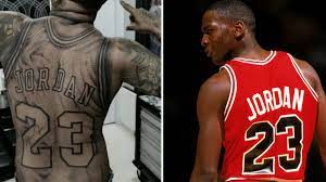 The odyssey of michael jordan and the photo of a much younger mj shows a faint tattoo on the left side of his chest. Michael Jordan Jersey Tattoo Covers Venezuelan Man S Back Photo Sports Illustrated