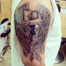 Realistic Fallen Angel Tattoo On Man Right Shoulder Arm Tattoos For Guys Angel Tattoo Men Tattoos