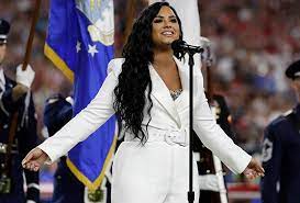 Demi lovato belts powerful rendition of the national anthem at super bowl liv the pop star's emotional performances is one of her first live performances since her drug overdose in july 2018 Watch Demi Lovato Perform National Anthem At Super Bowl Video Tvline