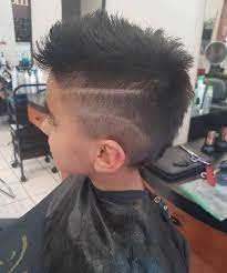 In particular, the faux hawk fade is a simple yet versatile hairstyle that not only looks stylish and modern, but allows you to try plenty of other styles. 5 Ways To Style Boys Faux Hawk Hairstyles Cool Men S Hair