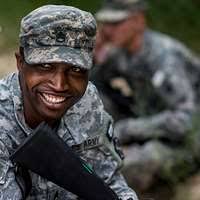 U.S. Army Pfc. Robert Nelson, left, assigned to 687th