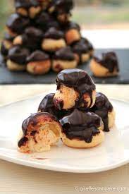 Profiteroles With Warm Chocolate Sauce Recipe Profiteroles Dinner Party Desserts Warm Chocolate