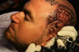 Lower back tribal tattoo designs. Lowrider Tattoo Studio Inkmobb
