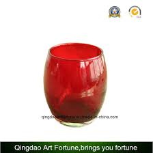 First, melt your desired candle wax. China Red Color Printed Egg Shaped Glass Votive Candle Holder China Glass Votive And Glass Jar Price