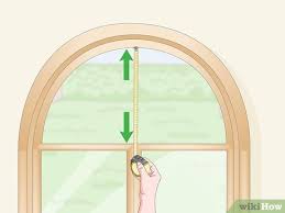 Window treatments can go a long way toward boosting your home's energy efficiency, keeping you comfortable. 3 Ways To Cover Arched Windows Wikihow
