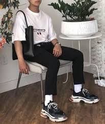 Balenciaga branding is found on the side of the shoe, while oversized rope laces add to the exaggerated theme of the sneaker. 13 Balenciaga Triple S Outfit Ideas Mens Outfits Streetwear Fashion Sneakers Men Fashion