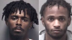 Two men arrested after allegedly robbing victim at gunpoint
