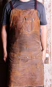 small brown canvas and leather work apron waxed leather working leather work gloves leather diy