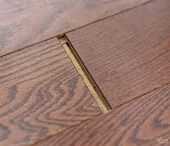If necessary, use painters tape to hold. How To Fix Floating Floor Gaps Diy Floor Gap Fixer The Navage Patch