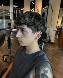 Short curly hair for men gets an instant boost with added color or  highlights, enhancing the definition and form of every curl