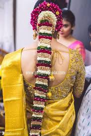 One of the best indian wedding hairstyles for long hair is the bubble braid. Hair Accessories For The Perfect South Indian Bride Wedmegood