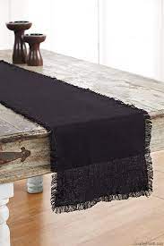 Use a table runner to create a focal point for your centerpiece, dress up the. Burlap Black Table Runner