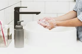what causes urgent poop sweats