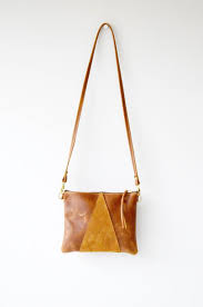The rich blue color in combination with gold. Modern Leather Purse Triangle Leather Crossbody Bag Leather Etsy Leather Purses Leather Crossbody Leather Crossbody Bag