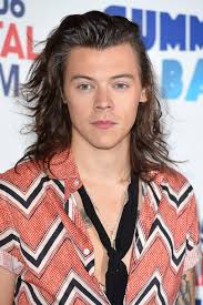 The top harry styles haircut looks for men 1 the short curls. Harry Styles Hairstyles Pictures Photos One Direction Pictures Glamour Uk