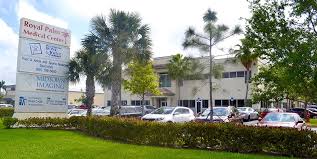 Southwest corner village & palm beach lake. The Center For Bone Joint Surgery Of The Palm Beaches