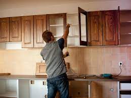 Begin your project by using a level to mark the locations of the wall and base cabinets. Should You Install Your Own Kitchen Cabinets Deseret News