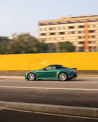 Image result for Viridian Green 2012 Aston Martin