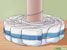 Learn how to make an adorable and practical diaper cake. 3 Ways To Make A Diaper Cake Wikihow