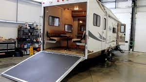 All the tanks are located under the floor to lower the center of gravity for increased storage capacity and improved handling down the road. 2012 Freedom Express Toyhauler 301blds Review Youtube