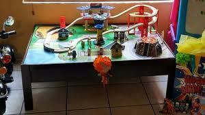 From the elevated train station, kids can embark on an adventure across town as they push the magnetic train along the. Kidkraft Airport Express Espresso Wooden Train Set Table With 91 Pieces Storage Drawer Walmart Com Walmart Com