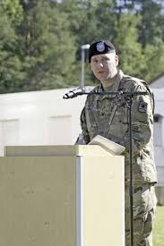 Seven years later, Heston returns to 361st Civil Affairs Brigade as new  commander