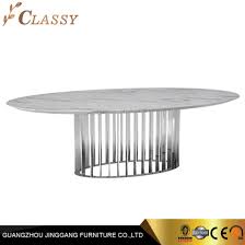 A set with 6 chairs is popular today. China Classy Modern Oval Marble Dining Table Stainless Steel Base China Marble Dining Table Restaurant Table
