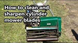 Insert a blade sharpener into a standard drill. How To Clean And Sharpen Your Cylinder Mower Blades Youtube
