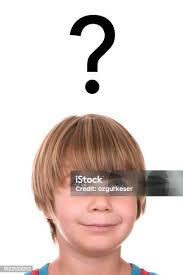 Baby Boy And Question Mark On Gray Wall Stock Photo