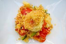 Algerian couscous includes tomatoes and a variety of legumes and vegetables. Lemon Scented Vegetarian Couscous Green Prophet