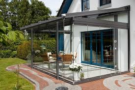 Because the new extension extends beyond the existing width of the house, the glass extension is going into a relationship with the existing annex. Solarlux Glass Box Extensions Choose Spectrum Architectural Glazing