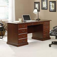 Grommet holes in desk top for cord management. Heritage Hill Executive Desk 402159 Sauder Sauder Woodworking