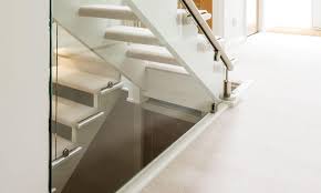 A glass screen lines the staircase and accentuates the lightweight feel. Glass And Steel Staircase Design Neville Johnson